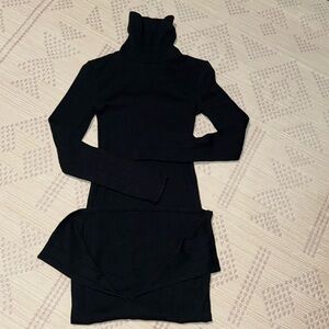 Black dress, back slit. Turtleneck. Xsmall. Long sleeves.